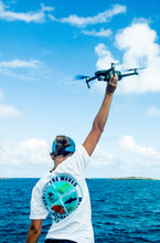 Load image into Gallery viewer, Beneath The Waves Campaign Performance Tee - Exuma, Bahamas
